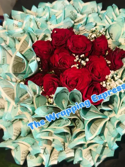 For a wedding shagan, I created this beautiful bouquet combining fresh red roses with carefully folded currency notes. It’s a much more memorable gift than a simple envelope.