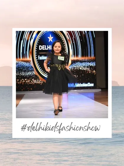 A chic black dress with a gold accent makes this young model look stylish and poised. Her confident walk demonstrates the poise that kids develop at my events.