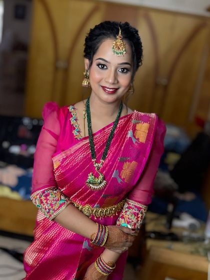 I've worked with the beautiful Sona countless times, and she's always a favorite. Here she is for her son's naming ceremony, with a quick change of lips and eyes to match her second saree.
