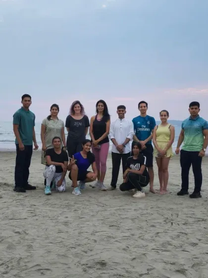 A happy and energized group after a fulfilling sunset yoga flow. Practicing together builds a wonderful sense of community and shared accomplishment.