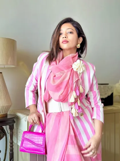 Another portrait, feeling chic and ready to take on the world in this unique saree look.