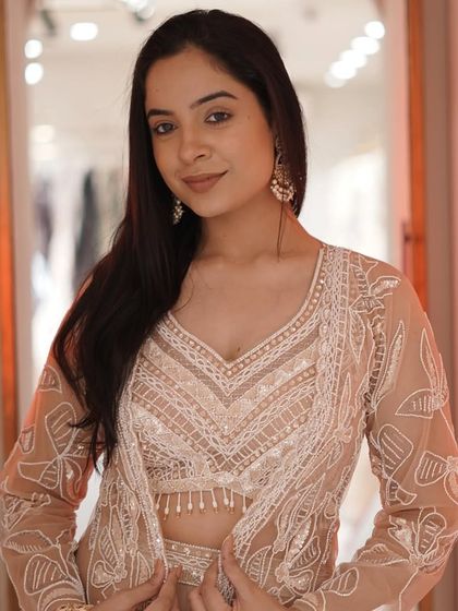 Make a statement with this breathtaking palazzo cape set, where modern chic meets regal sophistication.