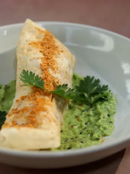 A Twist on Dosa: Malabar Green Onion Masala Dosa: This protein-packed dosa is made with a nutritious batter of jackfruit flour, amaranth, and brown rice. It's filled with a savory green onion and potato masala, offering a perfect balance of taste and health.