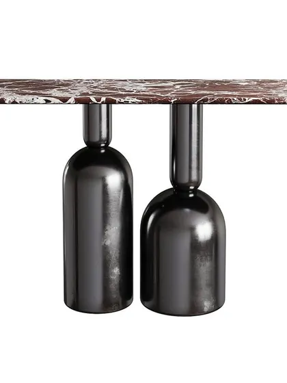 This innovative console table features legs made from steel, shaped like bottles or champagne flutes. The top is a beautiful slab of red-veined marble, creating a playful yet luxurious design.