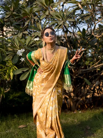Peace out! A happy bride enjoying her wedding day photoshoot.