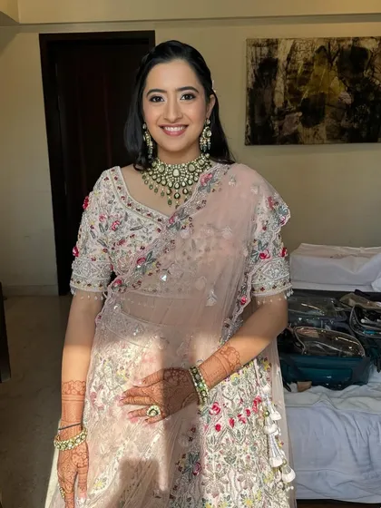 Enhancing beauty one brushstroke at a time. This look for Ritu features a soft, pastel color palette and a radiant finish, perfect for a daytime event.
