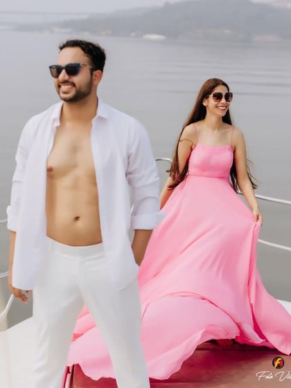 A fun and stylish pre wedding shoot on a yacht in Goa. We capture a mix of posed and candid moments that reflect the couple's personality.