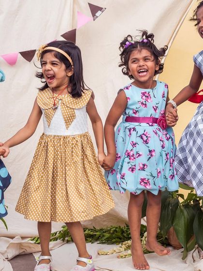 Four friends, all dressed in unique Doyne's creations. It’s so much fun to see how different prints and colors come together to create a vibrant, happy group.