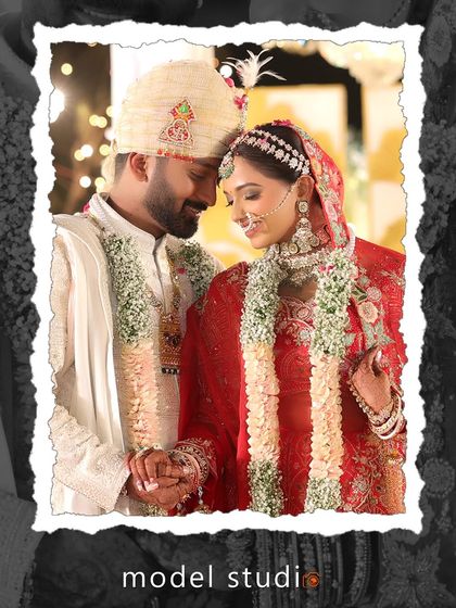 An artistically framed photo of a couple during their wedding ceremony. The torn-paper effect adds a creative touch to this classic, intimate portrait of the bride and groom.