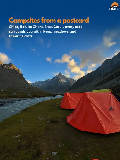Your home in the mountains. We set up our campsites in postcard-perfect locations like Balu ka Ghera on the Hampta Pass trek, right next to rivers with towering cliffs around you.