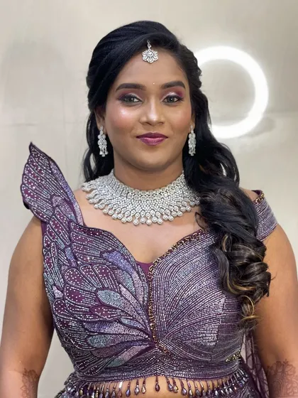 A full view of the stunning butterfly-inspired reception outfit.
