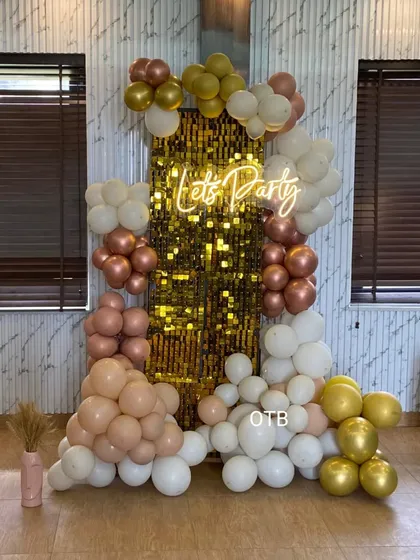 A full view of the 'Let's Party' sequin wall backdrop. The way the sequins catch the light is amazing in photos and videos.