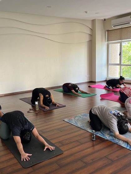 A moment of surrender in Balasana, or Child's Pose. This is a grounding posture I incorporate into every class to give you a chance to rest, connect with your breath, and release tension in your lower back.