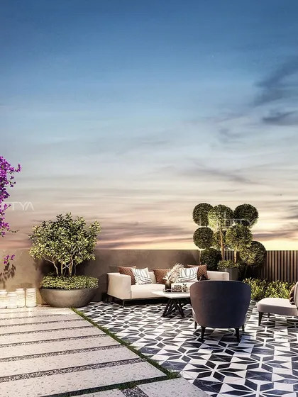 A visualization of a serene rooftop escape. We designed this terrace with stylish patterned flooring, comfortable modern furniture, and lush plantings, including vibrant bougainvillea, to create a perfect setting for unwinding against a sunset sky.