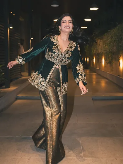 A candid and happy shot of Rupali Jagga, her smile is as bright as her outfit. You can catch a glimpse of our statement ring adding to her sparkle.