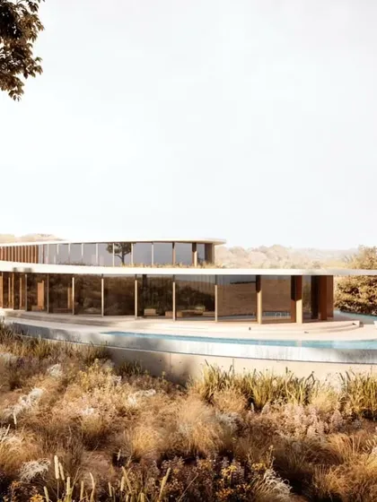 The villa appears to float above the landscape, a testament to a design that respects and enhances its natural setting.