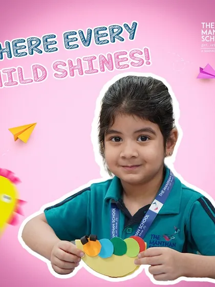 We believe every child is a star. This student proudly displays her colorful artwork, a perfect example of how we provide opportunities for every child to shine.