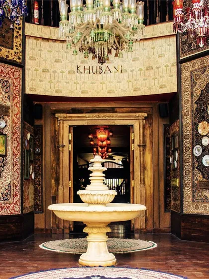 From the moment you enter, we transport you to a world of Persian royalty. Our grand foyer, with its majestic fountain, intricate carpets, and opulent chandeliers, sets the stage for the luxurious experience that awaits inside.