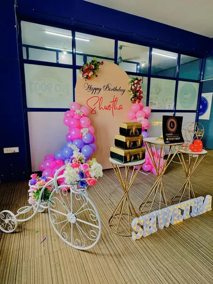 This angle includes more of the decorative bicycle prop, showing how even small details add to the overall charm of the event decor.