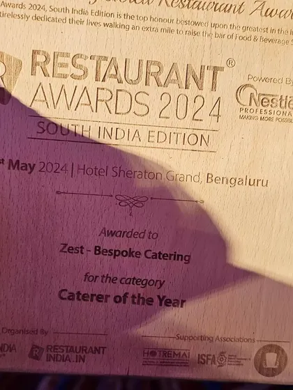 A close-up of the "Caterer of the Year" award from the Restaurant Awards 2024.