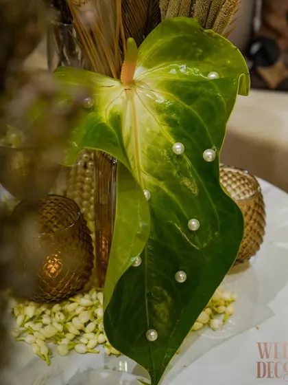 A single anthurium leaf adorned with tiny pearls. This is an example of the meticulous, handcrafted details I love to incorporate into my floral designs.