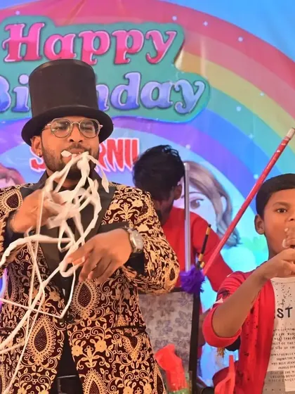 The more the merrier. This paper-pulling trick is even funnier with two volunteers on stage, creating a memorable and hilarious moment for this birthday celebration.
