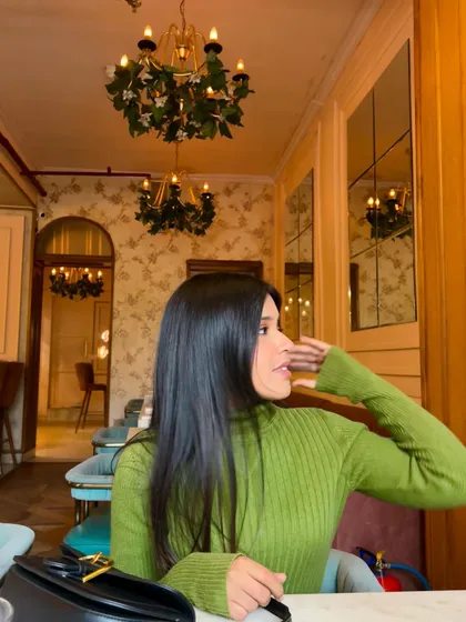 A candid moment in a cafe. I love performing in intimate settings like this, where the connection with the audience is immediate.
