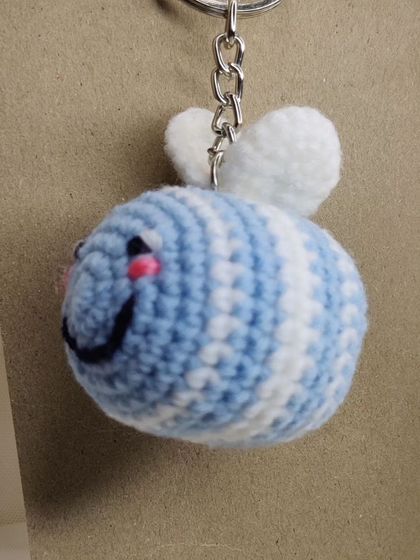 My super popular bumblebee keychains. They come in the classic yellow and black, but I also make them in fun colors like pink, blue, and purple.