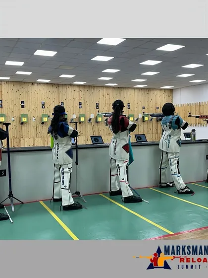 A wide view of our 16-lane ISSF standard shooting range during the Marksmanship Summit. Shooters are in full gear, demonstrating the professional environment we provide for every national-level air rifle and air pistol competition.