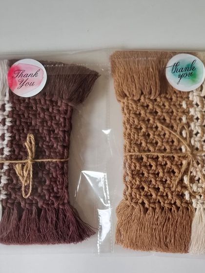 Two different colorways of my rectangular coasters, packaged and ready to go to their new homes.