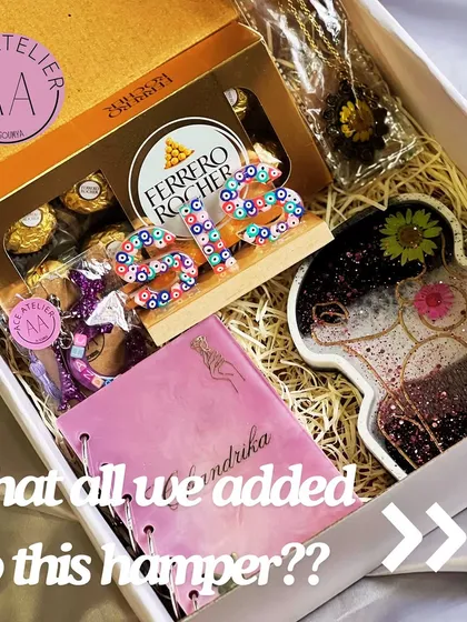 I love putting together the perfect gift hampers for your loved ones. This Rakshabandhan hamper for a sister includes a personalized diary, a trinket dish, a name stand, and chocolates, all beautifully packaged and ready to gift.