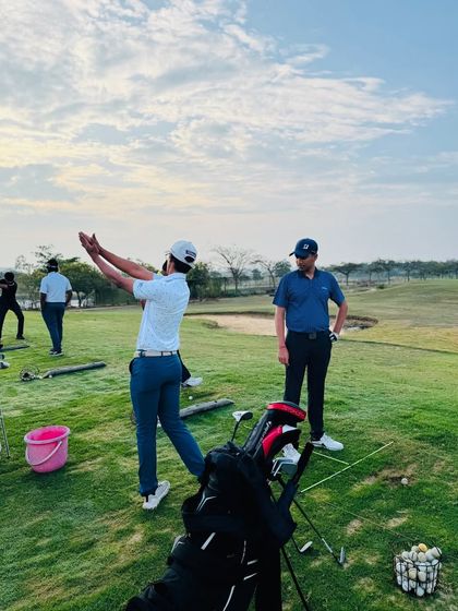 Our coaches are constantly on the range, providing hands-on instruction. From demonstrating a swing path to analyzing a student's setup, these moments of direct mentorship are where real progress is made.