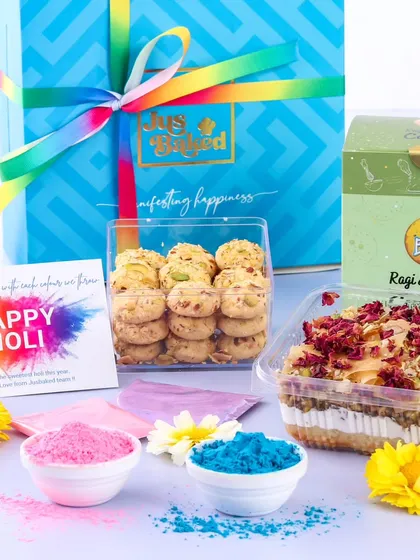 Our Holi hamper is all about spreading love with color and sweetness. It includes our special Thandai cheesecake tub and a box of our popular Ragi & Raisin cookies.