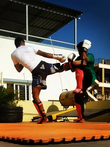 Another angle of a high kick drill. We practice these kicks repeatedly to build flexibility, balance, and power.