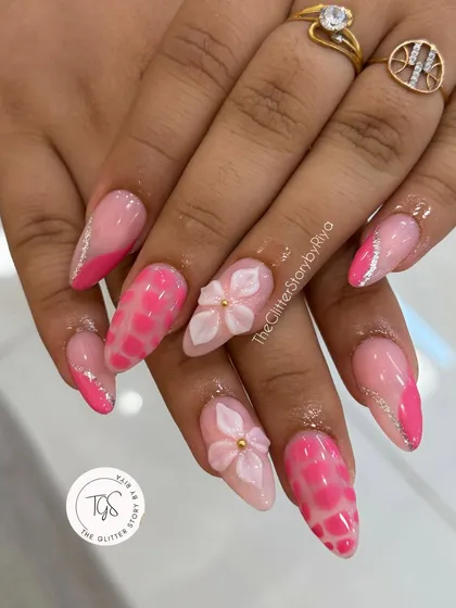 A playful and vibrant bridal set in shades of pink. This design includes a trendy crocodile print, silver glitter accents, and delicate 3D flowers for a fun and modern bride.