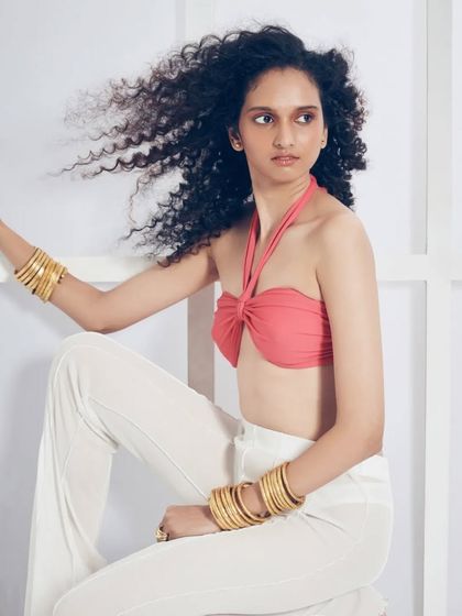 A bright and breezy fashion look. I styled the model's hair to embrace its natural volume and kept the makeup fresh and sun-kissed to complement the summery vibe of the shoot.