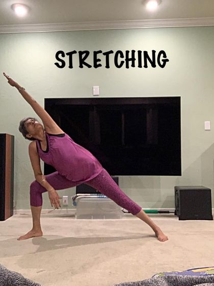 Stretching in my home practice space. Consistency is key, and finding a way to move your body every day is a powerful form of self-care.