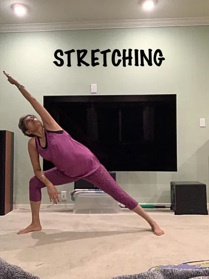 A demonstration of Extended Side Angle Pose in a home setting, showing how you can achieve a great stretch anywhere.