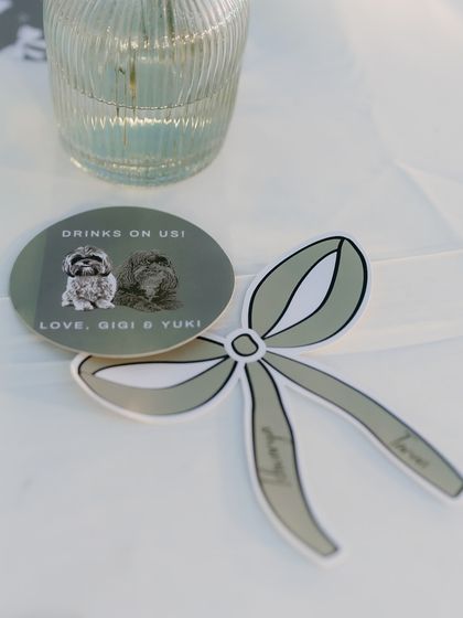Custom coasters featuring illustrations of the couple's beloved pets, a sweet and personal touch.