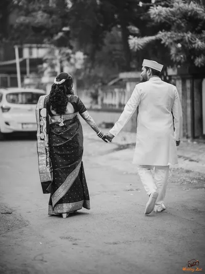 A timeless black and white photo of Prachi and Ketan walking hand-in-hand. This classic shot symbolizes the beginning of their journey together.