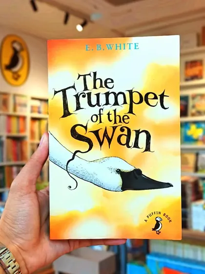 'The Trumpet of the Swan' by E.B. White is a beautiful story about a swan born without a voice who learns to play the trumpet.