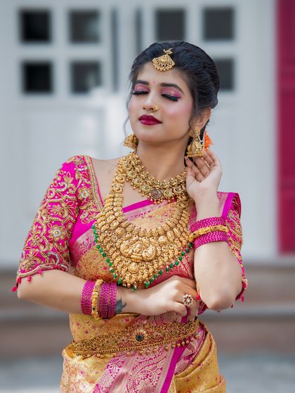 A close-up showing the soft pink eyeshadow and perfectly defined brows. This look is a great example of how to use color in a way that is elegant and not overpowering.