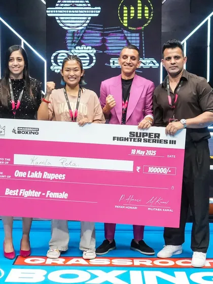 We put our money where our mouth is. Here we are awarding Kamla Roka with a ₹1,00,000 check for Best Female Fighter, a part of our commitment to rewarding excellence.