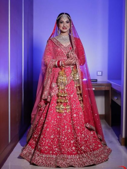 So elegant and graceful. This bride's pink and red lehenga was so unique, and I created a soft makeup look to match its beauty.