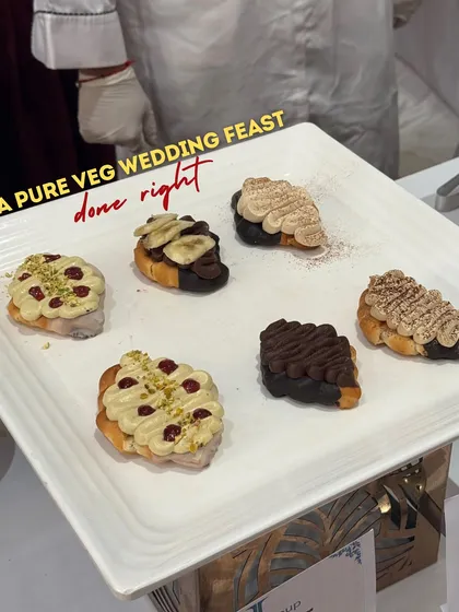 A pure veg wedding feast done right. This platter of assorted mini croissants topped with different creams and fruits shows our creative dessert offerings.