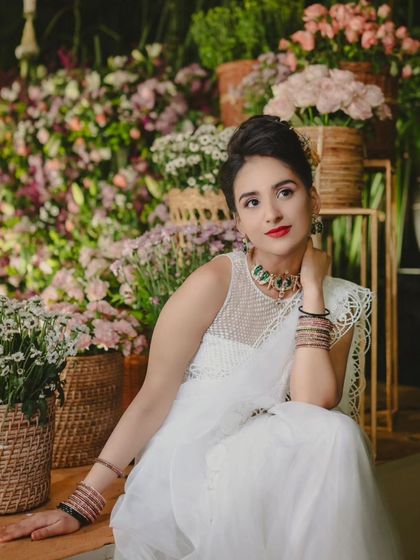 A collection of outfits perfect for any celebration. From intricate lehengas to shimmering sarees, these pieces are designed to ensure you are the best dressed guest at any event.