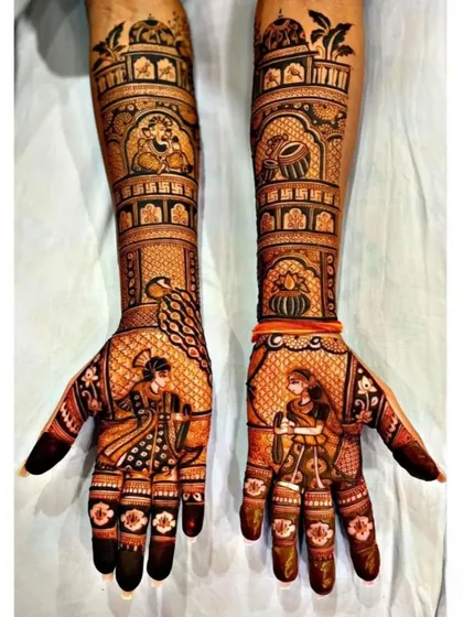 A Karwa Chauth special design, this mehndi shows a woman with a puja thali, celebrating the festival. We create designs for all occasions.