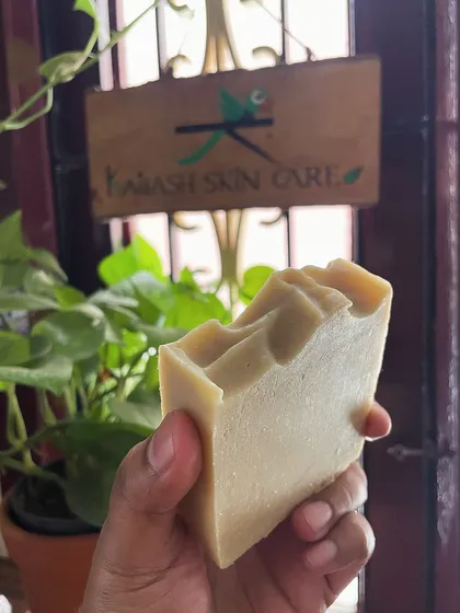 (Duplicate of 12) Holding up a finished bar of my Multanimitti Avocado Butter soap. I love how creamy and nourishing this soap feels, thanks to the avocado butter I add for extra moisture.