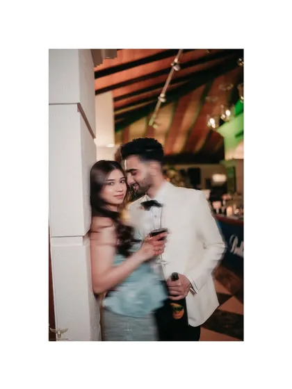 Another artistic shot using a slow shutter speed to create a sense of intimacy and movement. The focus remains on the couple's close connection, even with the creative blur effect.