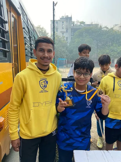 Every player gets a chance to shine and win. Here's another happy winner from our tournament day.